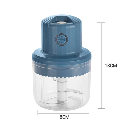 Blue hand chopper with clear container and measurements on a white background