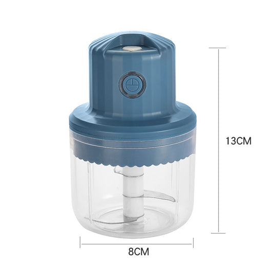 Blue hand chopper with clear container and measurements on a white background