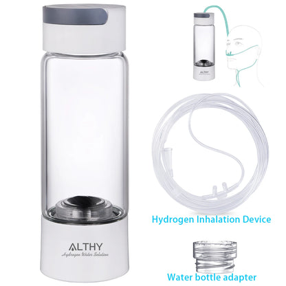 Clear water filter bottle with accessories on a white background
