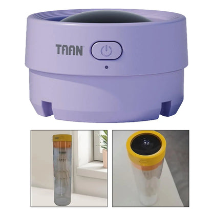 Purple electronic device with 'TAAN' branding on a white background, showing close-up insets of its use.