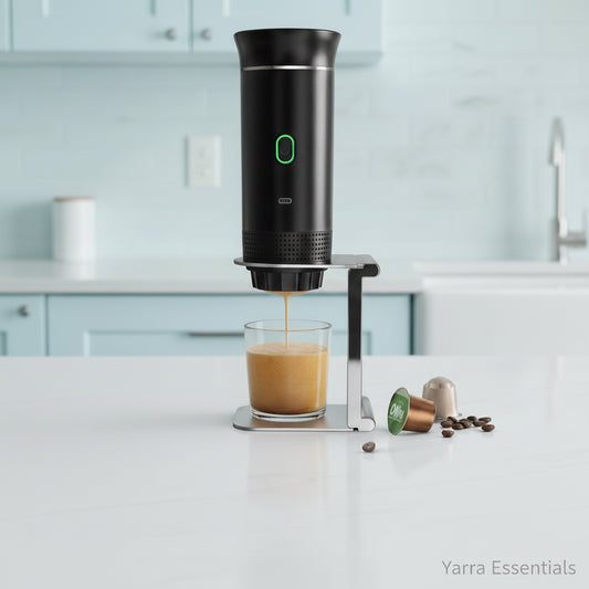 usb-electric-portable-espresso-coffee-machine-for-car-home-camping-coffee-maker-3-in-1-capsule-powder-travel-coffee-maker dispensing coffee into a glass on a kitchen counter.
