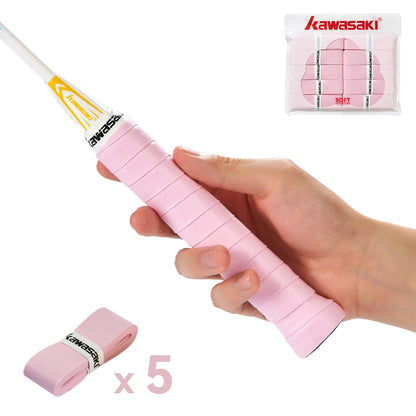 Hand holding a pink tennis racket with Kawasaki branding, including racket and packaging on a white background.