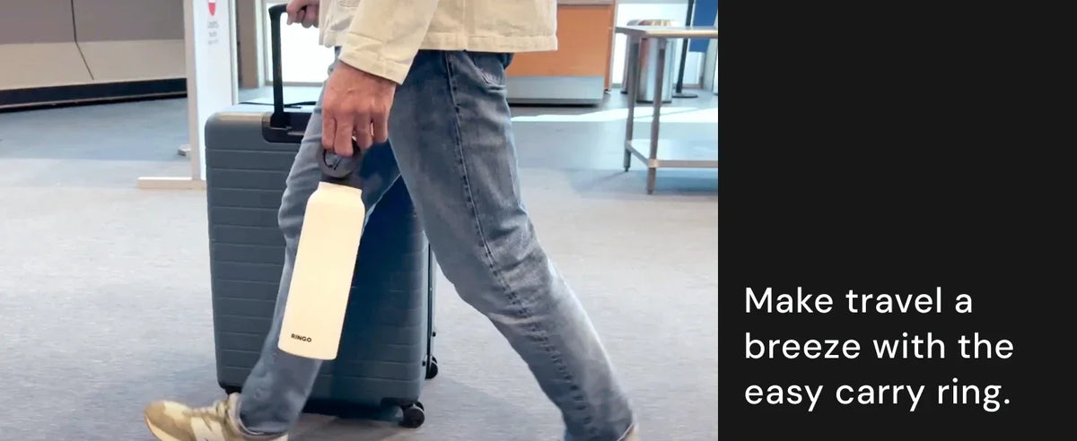 Person walking with a suitcase and carrying a white object, with text promoting an easy carry ring.