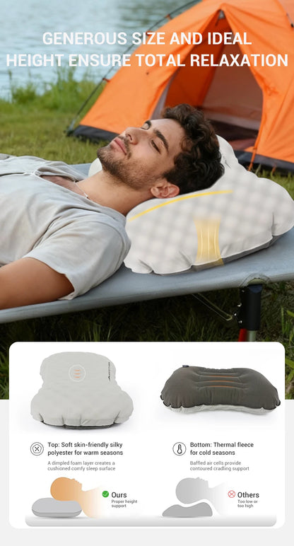 Person lying on a camping pillow with an orange tent in the background