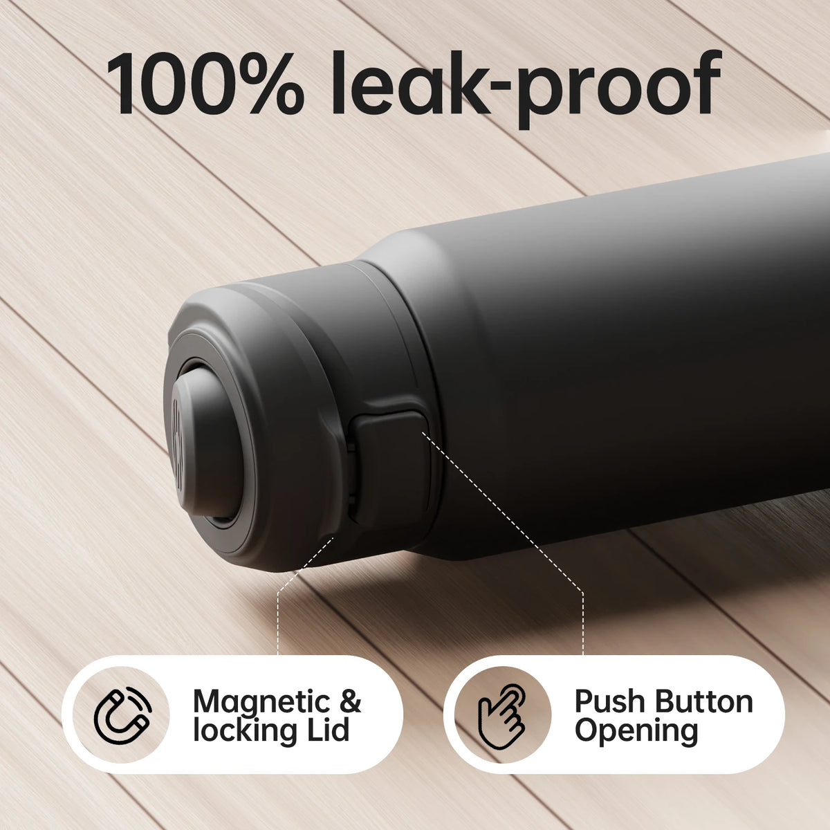 Black water bottle with features highlighted on a wooden surface