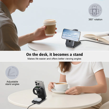 Person using a smartphone stand on a desk with a cup of coffee and phone.