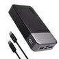 Black and gray power bank with USB-C cable on a white background