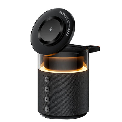 Black portable speaker with a glowing interior on a white background