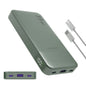 Green power bank with multiple USB ports and charging cables on a white background