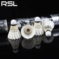 Four badminton shuttlecocks with RSL branding on a dark background