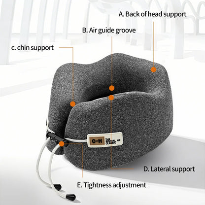 Gray travel neck pillow with labeled features on a white background