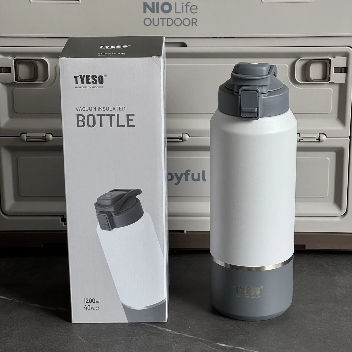 White and gray insulated bottle with packaging and 'NIO Life Outdoor' branding.