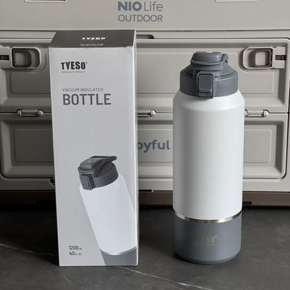 White and gray insulated bottle with packaging and 'NIO Life Outdoor' branding.