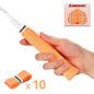 Hand holding an orange badminton racket grip with Kawasaki packaging and additional grips on a white background