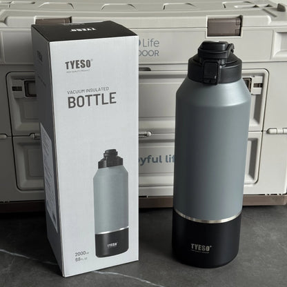 TYESO vacuum insulated bottle with packaging on a dark surface