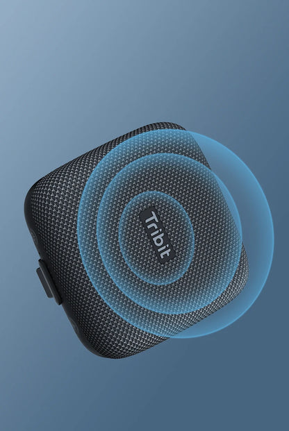 Black textured product with blue concentric circles and 'Tribit' branding on a gradient blue background
