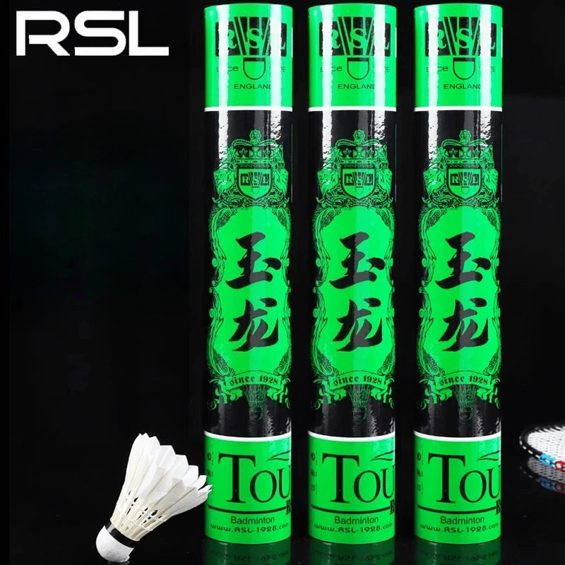 Three barrels RSL badminton shuttlecock packages with a white shuttlecock in front on a black background, featuring the RSL brand.