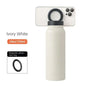 Ivory white water bottle with black magnetic ring attachment on a white background