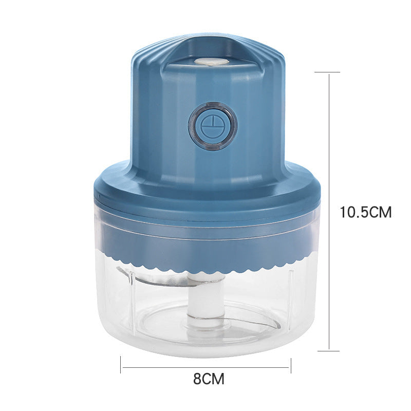 Blue kitchen chopper with clear container and measurements on a white background